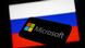 Логотип фирмы Microsoft на фоне российского флага Логотип фирмы Microsoft на фоне российского флага