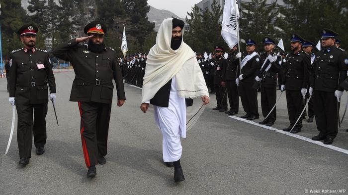 Taliban Interior Minister Sirajuddin Haqqani reviews new Afghan police recruits in Kabul