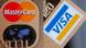 A picture of a Visa credit card next to a Mastercard A picture of a Visa credit card next to a Mastercard