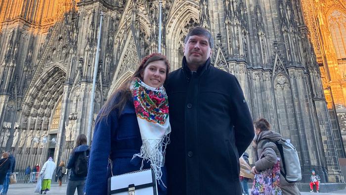 Pastor Mykola Pavlyk and Solomia Pavlyk outside Cologne Cathedral