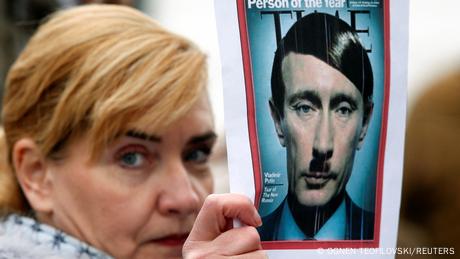 Is Putin in the seat of the Hague Tribunal?