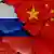 Флаги России и Китая на стене