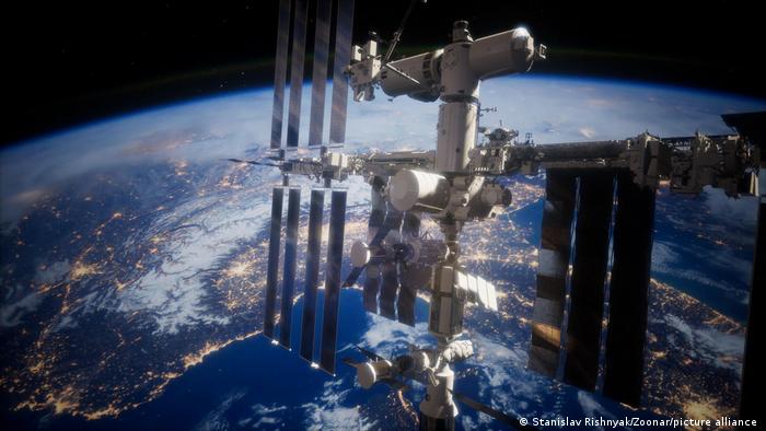 A view of the Earth and a spaceship. ISS is orbiting the Earth