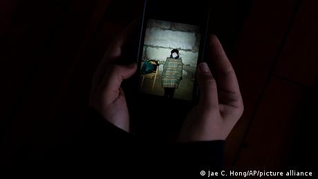 photo of a woman on a phone