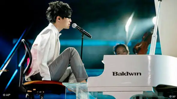 Liu, who lost both arms in a childhood accident, won "China's Got Talent" performing his version of James Blunt's song "You're Beautiful". The 23-year old Beijing native started playing the piano at 19. His first teacher quit because he thought it was impossible for someone to play with their toes.