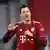 Robert Lewandowski celebrates his hat-trick by holding up three fingers on his right hand