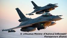 In this photo provided by Lithuanian Ministry of National Defense, Polish Air Force F-16 fighter jets participating in NATO's Baltic Air Policing Mission operate in Lithuanian airspace, Tuesday, Jan. 25, 2022. The NATO defence alliance on Monday said it was dispatching additional fighter jets and ships to Eastern Europe amid tensions with Russia. (Lithuanian Ministry of National Defense via AP)