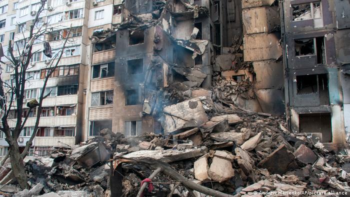 A destroyed apartment building in Kharkiv