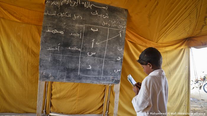 Yemeni children continue education in tents after most schools were damaged or collapsed due to the civil war. 