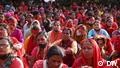 Female health workers in India participate in a demonstration demanding better working conditions and wages