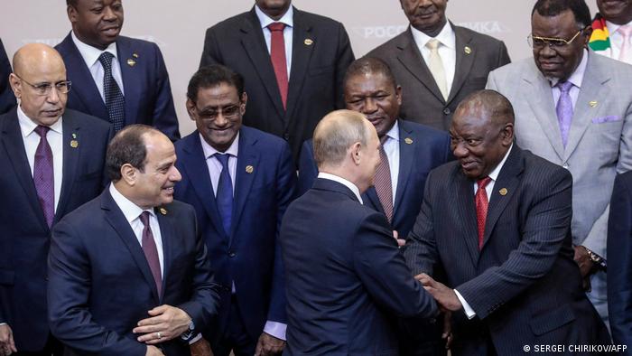 Russian President Vladimir Putin and South African President Cyril Ramaphosa surrounded by other African heads of state
