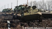 ROSTOV-ON-DON REGION, RUSSIA - FEBRUARY 22, 2022: Military hardware moves on a road. On February 21, Russia recognized the Donetsk and Lugansk People's Republics, the friendship, cooperation and mutual assistance treaties signed with their leaders. Stringer/TASS