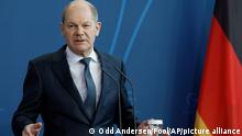 German Chancellor Olaf Scholz addresses a press conference at the Chancellery in Berlin after talks with the Canadian Prime Minister on March 9, 2022. (Odd Andersen/Pool via AP)