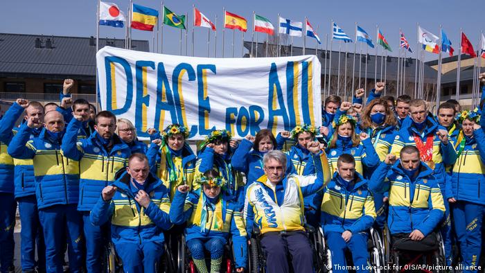 Ukraine's athletes at the Beijing Paralympics appealed for peace, holding a banner reading Peace for All