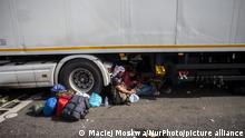 Sleeping refugees under truck at closed Hungarian border in Horgos, Serbia. Hungary has been a major transit country for migrants, many of whom aim to continue on to Austria and Germany.In 2015, Hungary built a border barrier on its border with Serbia and Croatia. The fence was constructed during the European migrant crisis with the aim to ensure border security by preventing refugees and immigrants from entering illegally, and enabling the option to enter through official checkpoints and claim asylum in Hungary in accordance with international and European law. The number of illegal entries to Hungary declined greatly after the barrier was finished. After construction of barbed wire fence few clashes erupted between migrants and Hungarian riot police. (Photo by Maciej Moskwa/NurPhoto)