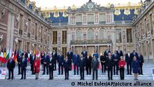 European Union leaders pose for a group photo at an EU summit at the Chateau de Versailles, in Versailles, west of Paris, Thursday, March 10, 2022. European Union leaders on Thursday will focus on how to help Ukraine in its war with Russia, but the measures discussed are expected to stop short of fulfilling the country's hopes it can soon join the bloc. (AP Photo/Michel Euler)