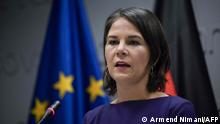 Germany's Foreign Minister Annalena Baerbock speaks during a joint press conference with Kosovo's Prime Minister Albin Kurti following their meeting in Pristina on March 10, 2022. - Baerbock is on a two-day official visit to Kosovo. (Photo by Armend NIMANI / AFP)