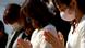 People wearing protective masks, amid the coronavirus disease (COVID-19) outbreak, pay a silent tribute to mourn the victims of the March 11, 2011 earthquake and tsunami, on the 11th anniversary of the events that killed thousands and set off a nuclear crisis People wearing protective masks, amid the coronavirus disease (COVID-19) outbreak, pay a silent tribute to mourn the victims of the March 11, 2011 earthquake and tsunami, on the 11th anniversary of the events that killed thousands and set off a nuclear crisis