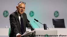 DFB president Bernd Neuendorf speaking at a podium at the 44th Ordinary DFB-Bundestag at the World Conference Center Bonn
