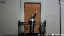 Chile's President Gabriel Boric gestures to supporters at La Moneda Palace in Santiago, Chile March 11, 2022. REUTERS/Ivan Alvarado TPX IMAGES OF THE DAY 