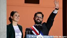 Chile swears in former student leader as youngest president 