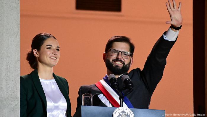 Chile swears in former student leader as youngest president | News | DW ...