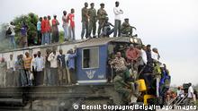 - BOMA, DRC CONGO : Illustration picture shows residents on a train during the visit of Belgian Minister of Development Cooperation Charles Michel and Foreign Minister Karel De Gucht Boma, DRC Congo, Tuesday 22 April 2008. Foreign Minister De Gucht is on a one week visit in Congo. BENOITxDOPPAGNE PUBLICATIONxINxGERxSUIxAUTxONLY x9035350x