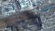 A satellite image shows burning apartment buildings at Zelinskovo street, in the western section of Mariupol A satellite image shows burning apartment buildings at Zelinskovo street, in the western section of Mariupol
