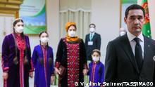  ASHGABAT, TURKMENISTAN - MARCH 12, 2022: The incumbent president s son, Turkmenistan s Deputy Prime Minister Serdar Berdimuhamedov front, and his family visit a polling station at Annaniyaz Artyk Secondary School No 68 to vote in the 2022 Turkmenistan snap presidential election. On February 11, 2022, Turkmenistan s President Gurbanguly Berdimuhamedov announced his intention to offer more access to public administration for the younger generation of leaders, and scheduled an early presidential election for March 12. The presidential campaign began on February 14, with the president s son Serdar Berdimuhamedov nominated from the ruling Democratic Party of Turkmenistan. Vladimir Smirnov/TASS PUBLICATIONxINxGERxAUTxONLY TS127850