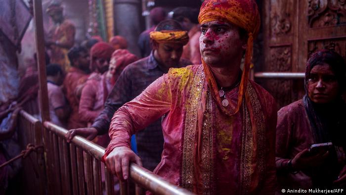 A man leaves the Radha Rani temple after prayer in Barsana, India