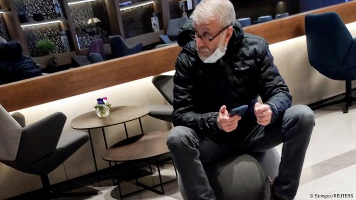 Roman Abramovich sits in a VIP lounge before a jet linked to him took off for Istanbul from Ben Gurion international airport in Lod near Tel Aviv, Israel