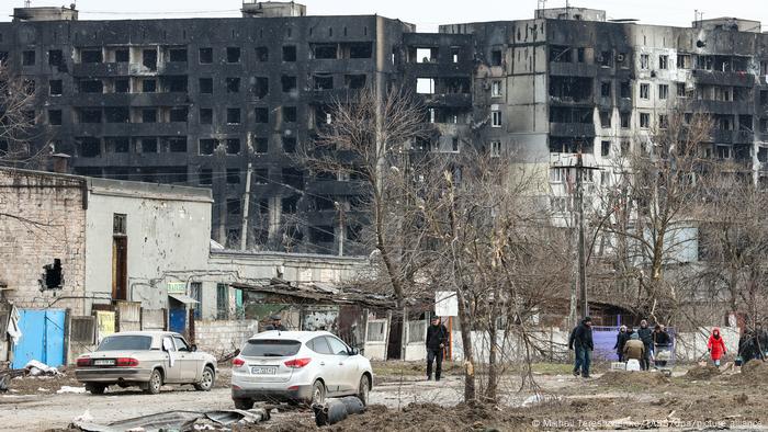 Blackened and burned-out buildings in Mariupol