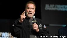 COLUMBUS, OHIO - MARCH 05: Arnold Schwarzenegger speaks to fans during the Slap Fighting Championships at the Arnold Sports Festival in Columbus Convention Center on March 05, 2022 in Columbus, Ohio. (Photo by Gaelen Morse/Getty Images)