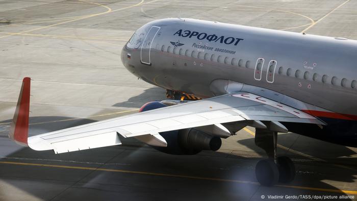 An Aeroflot plane sits on a runway