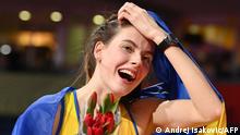 Winner Ukraine's Yaroslava Mahuchikh celebrates after victory in the women's high jump final during The World Athletics Indoor Championships 2022 at the Stark Arena, in Belgrade, on March 19, 2022. (Photo by ANDREJ ISAKOVIC / AFP)