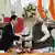 图为印度总理莫迪此次在新德里签署协议时与日本首相岸田文雄握手。