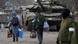 Civilians trapped in Mariupol are evacuated in groups under the control of pro-Russian separatists, in Ukraine on March 20, 2022 Civilians trapped in Mariupol are evacuated in groups under the control of pro-Russian separatists, in Ukraine on March 20, 2022