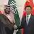 Crown Prince Mohammed bin Salman (left) and Chinese President Xi Jinping (right) shake hands in Beijing