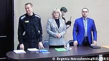 22.03.2022
Russian opposition leader Alexei Navalny, accused of fraud and contempt of court, his lawyers Olga Mikhailova and Vadim Kobzev are seen on a screen via a video link during a court hearing at the IK-2 corrective penal colony in the town of Pokrov in Vladimir Region, Russia March 22, 2022. Navalny is already serving a two-and-a-half year sentence at a prison camp east of Moscow for parole violations. REUTERS/Evgenia Novozhenina