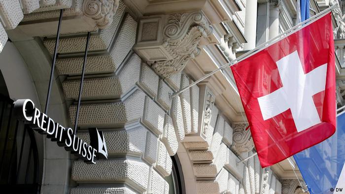 A Swiss flag outside a CreditSuisse bank