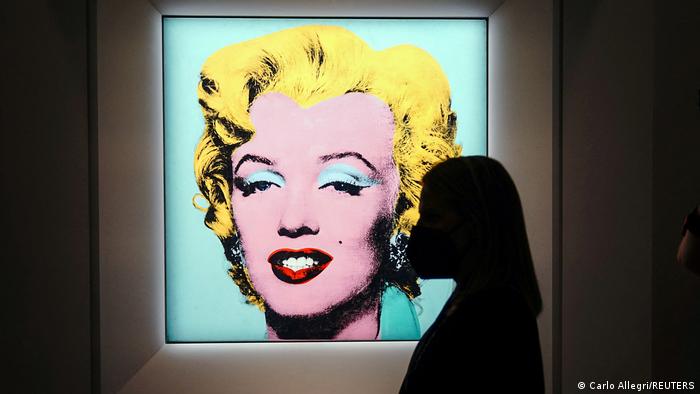 Andy Warhol's Shot Sage Blue Marilyn, a painting of Marilyn Monroe, is pictured on display at Christie's Auction House