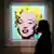 Andy Warhol's "Shot Sage Blue Marilyn", a painting of Marilyn Monroe, is pictured on display at Christie's Auction House