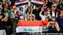 Iraqi football fans hold up their national flags to show support for Iraq national football team in the AFC Asian Cup group D match against Vietnam national football team in Abu Dhabi, United Arab Emirates, 8 January 2019. Iraqi football fans hyper after Iraq defeated Vietnam 3-2 in comeback win PUBLICATIONxINxGERxAUTxSUIxONLY 20190108_73239 