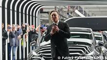 German Chancellor Olaf Scholz, Brandenburg Premier Dietmar Woidke and Elon Musk attend the opening ceremony of the new Tesla Gigafactory for electric cars in Gruenheide, Germany, March 22, 2022. Patrick Pleul/Pool via REUTERS