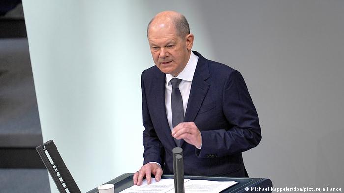 Olaf Scholz speaking to German MPs during a budget debate