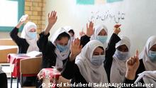 MAZAR-I SHARIF - AFGHANISTAN - OCTOBER 10: Afghan girls attend a class in a high school in Mazar-i-Sharif, Afghanistan on October 10, 2021. High school education continues for girls in only Mazar-i-Sharif. Sayed Khodaiberdi Sadat / Anadolu Agency