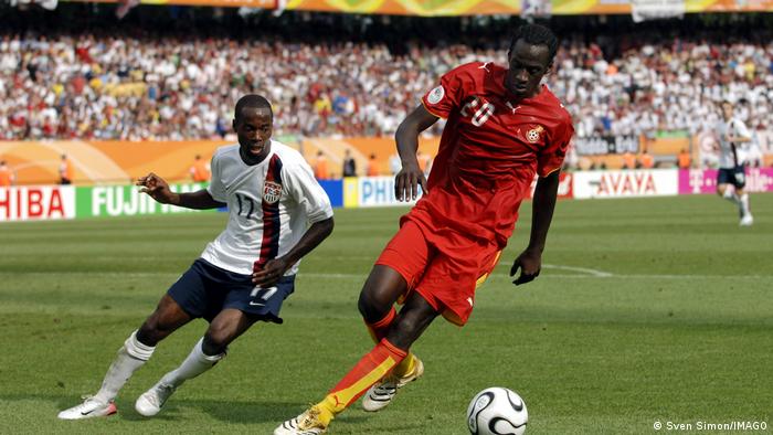 Otto Addo in shields the ball from DaMarcus Beasley in a 2006 World Cup game between Ghana and the USA
