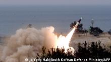 This handout photo taken on March 24, 2022 and provided by the South Korean Defence Ministry in Seoul shows an ATACMS (Army Tactical Missile System) projectile being launched from an undisclosed location around the East Sea (Sea of Japan), during a live-fire exercise after North Korea fired an intercontinental ballistic missile. (Photo by JO YONG HAK / South Korean Defence Ministry / AFP) / RESTRICTED TO EDITORIAL USE - MANDATORY CREDIT AFP PHOTO / South Korean Defence Ministry - NO MARKETING - NO ADVERTISING CAMPAIGNS - DISTRIBUTED AS A SERVICE TO CLIENTS