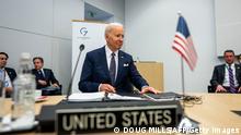 US President Joe Biden (C) takes his seat watched by US Secretary of State Antony Blinken (2L) as he prepares for the G7 Summit with other leaders at NATO Headquarters in Brussels on March 24, 2022. (Photo by Doug Mills / POOL / AFP) (Photo by DOUG MILLS/POOL/AFP via Getty Images)