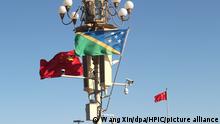 The national flag of Solomon Islands, which recently broke diplomatic relations with the government of Taiwan, flies outside the Forbidden City for the Prime Minister of Solomon Islands Manasseh Sogavare's official visit to China in Beijing, China, 8 October 2019. *** Local Caption *** fachaoshi